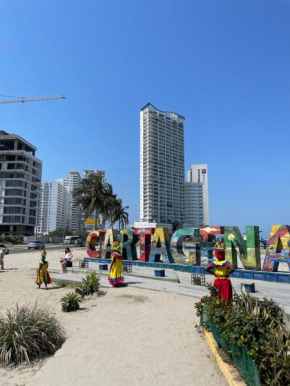Front beach apartment close to the Cartagena letters